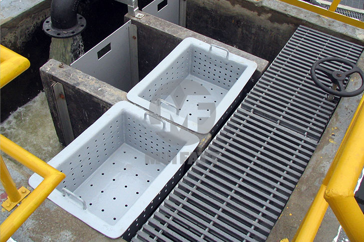 Industrial-grade FRP gratings and perforated filter baskets used in a sewage treatment plant for efficient water filtration and durability.