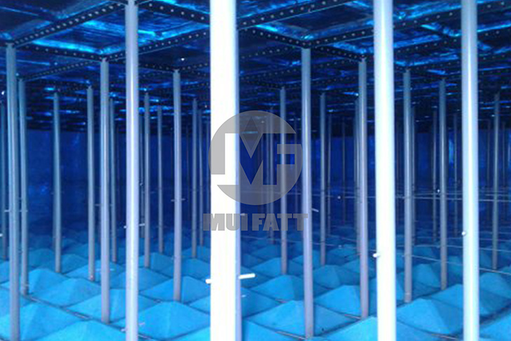 Inside view of assembled FRP panel tank showing support posts and confined entry environment