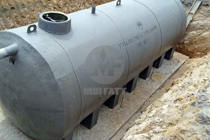 Mui Fatt MST septic tank installed in an excavated pit, supported by a concrete slab base to prevent shifting and ensure long-term stability.