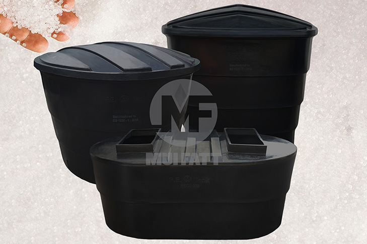 Three black polyethylene open top water tanks produced by Mui Fatt using the rotomolding process, ideal for water storage in residential and agricultural settings.