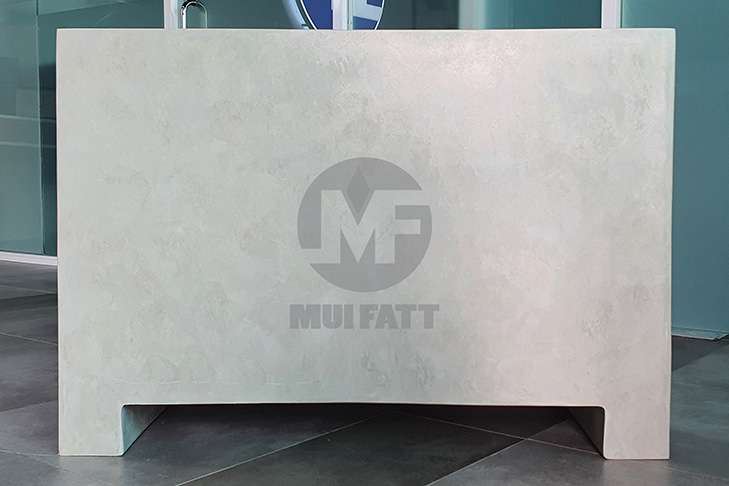 Custom rectangular FRP planter box in light grey concrete-look finish, part of the 2025 Tuta Courtyard landscaping at Tasek Central Mall