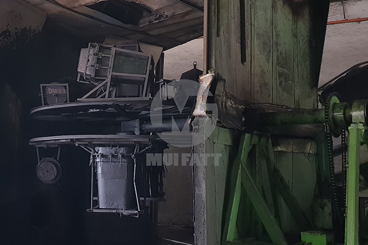 Rotational molding machine operating inside Mui Fatt’s PE production facility in Malaysia, showcasing biaxial movement for even wall thickness.