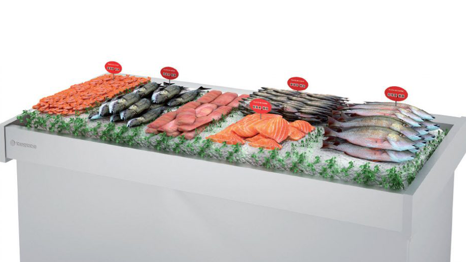 Similar seafood types grouping together on a fish display island table