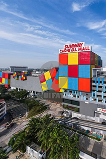 Aerial view of Sunway Carnival Mall showcasing its vibrant exterior with colorful blocks, located in the heart of Malaysia’s bustling retail scene.