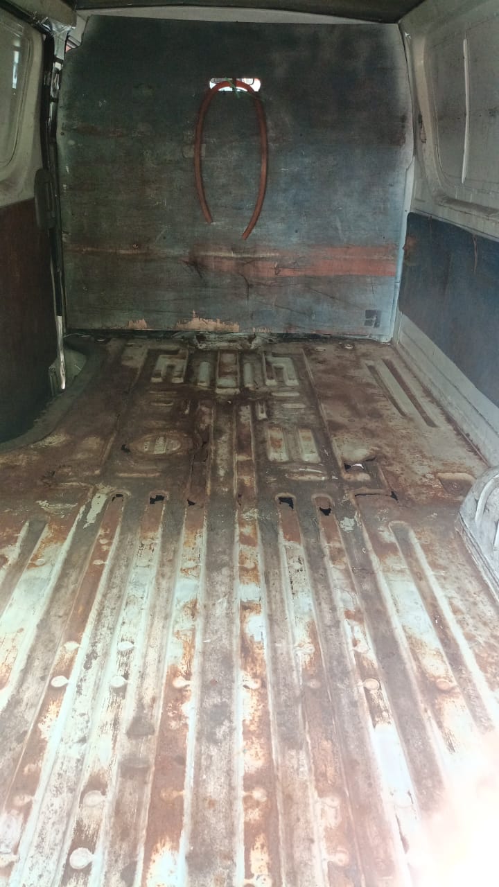 Rusted Van Floor Before Treatment